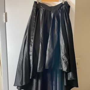 Beautiful skirt, short in the front and long in the back. A show stopper.